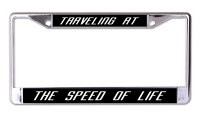 Traveling At The Speed Of Life Chrome License Plate Frame